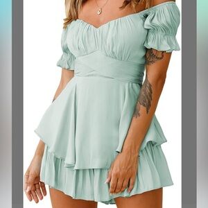 Turquoise Off the shoulder ruffled romper Size: M